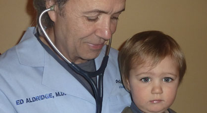 Doctor Helping a Child